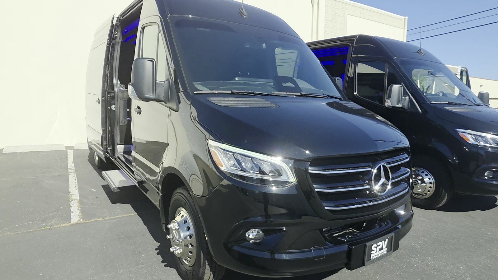 Ambient-lit Mercedes-Benz Sprinter lounge cabin for a Chicago group night out